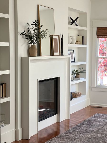 Parlor room, built in shelves, fireplace cb2 mirror, Target home, Amazon Roman shades 

#LTKhome