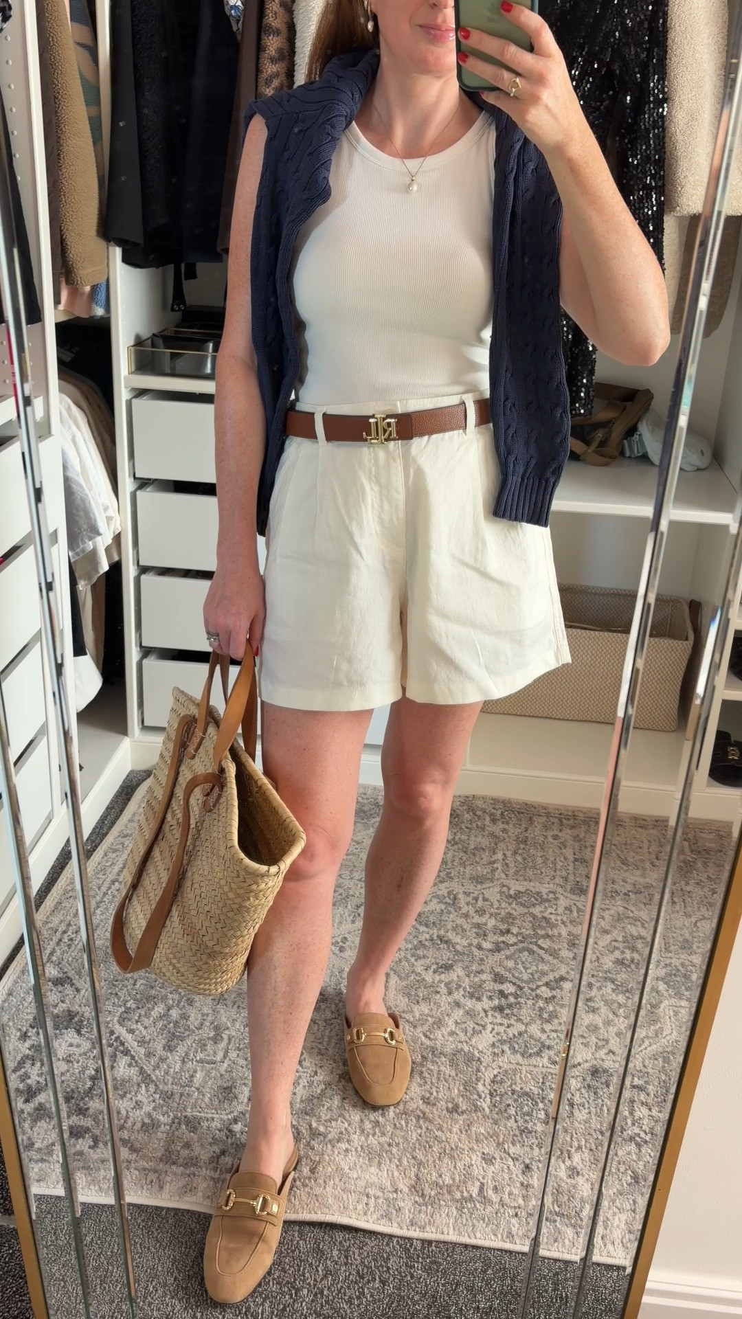 Same Uniqlo white vest and shorts, styled three ways 🤍 For this look, I added a navy cable knit sweater, woven market tote, tan belt and slip on loafers. The perfect mix of relaxed, polished and effortlessly put together. 💙 white shorts, tan belt, tan bag, summer outfits over 40 

 #LTKuk #LTKsummer #LTKtravel