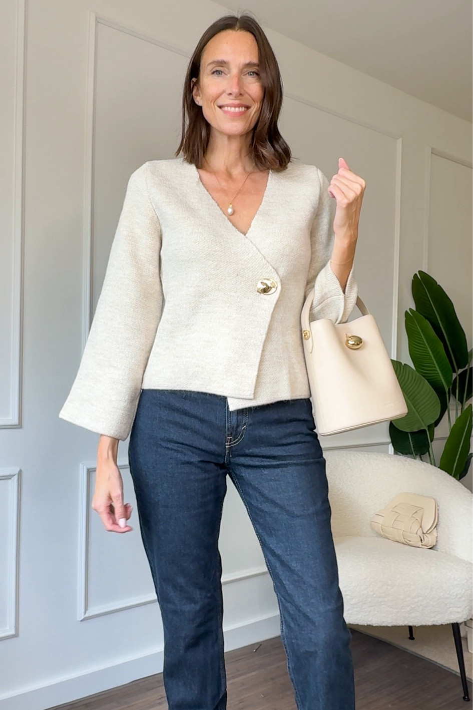 Dark denim jeans with a pale beige marl cardigan. I’m wearing a UK 8 in the jeans and a small in the cardigan  

#LTKFindsUnder50 #LTKSeasonal #LTKStyleTip
