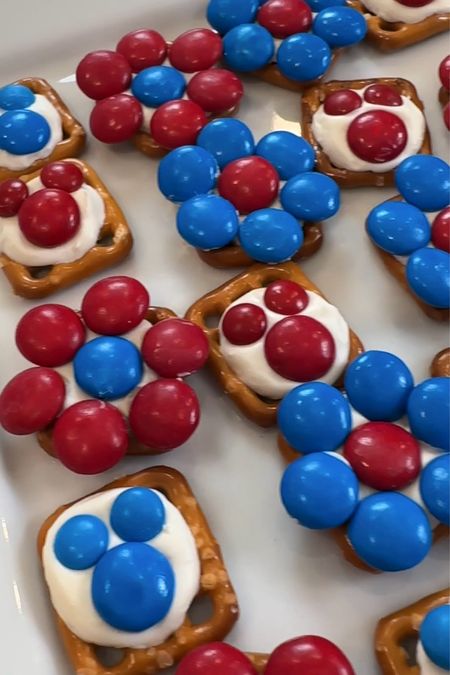 Looking for a fun and delicious way to celebrate Memorial Day and Fourth of July? These DIY Patriotic Pretzel Bites are the perfect festive treat to add to your party spread! Easy to make and bursting with patriotic colors, they'll be a hit with guests of all ages. Follow along at our blog youngwildme.com for step-by-step instructions and creative tips to make your own batch of these adorable and tasty snacks.  #PatrioticTreats #4thofJuly #4thofJulyTreats #SummerSnacks #MemorialDay


#LTKFamily #LTKHome #LTKParties