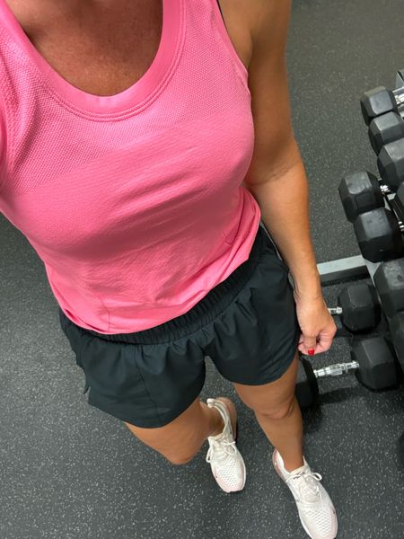 Workout style. Aritzia tank size small  
Linking similar black shorts. 

#LTKFitness #LTKOver40 #LTKActive