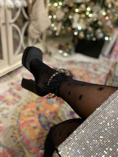 Chanel tights, CC tights, sparkle bag, rhinestone bag, Versace heels, satin platform heels, mesh socks 

#LTKHoliday #LTKshoecrush #LTKSeasonal