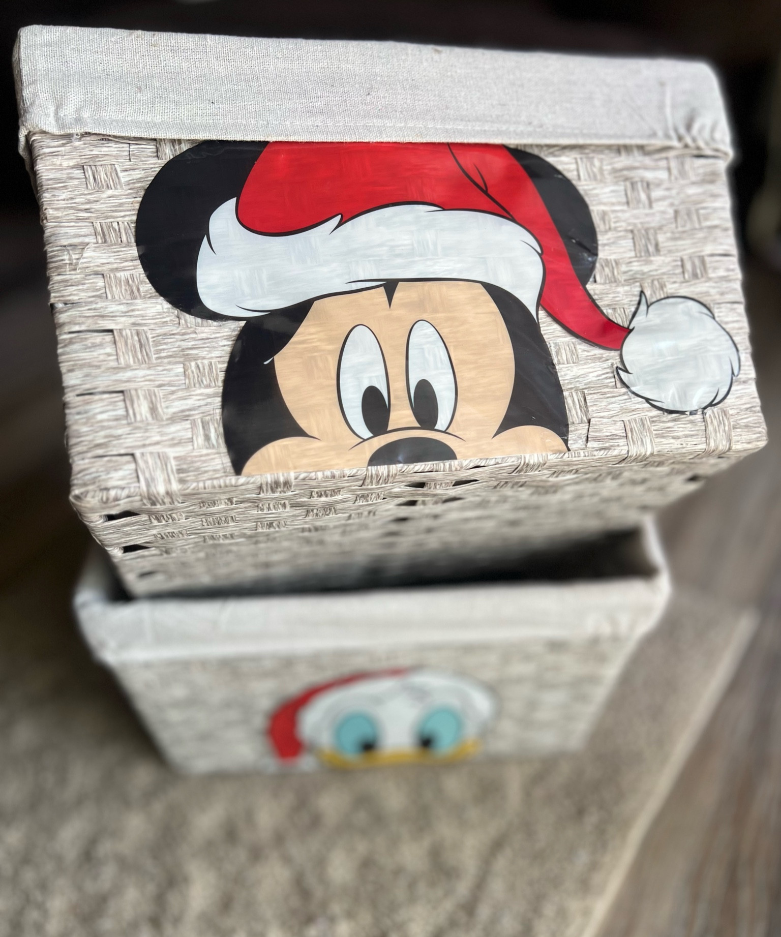 Disney Christmas Craft Idea!
Grab a couple of these hard plastic faux wicker baskets & hot glue on a Disney Christmas window cling very carefully. 

When I say gently, very gentle. Utilize a little trickle of glue to adhere the decals.

Optional: If the back side of your decal can stick with the heat from the glue gun, this method worked with a bit more patience required for it to stick. This way does crinkle the edges more so test and see what works for you. 

This image is soooooo the basic version 🤣! You can change out the lining to match your Christmas decor, add a ribbon trim, bows, foliage & berries, then trim with glitzy pine cones. 

Let’s chat fuller shall we: Cute faux birch logs, throw blankets, gifts, or as a planter for faux stems, you could even add scented vase filler or scent sachets.

Ooooo!!! You can sooo use this a counter / floor decor for mini trees! 

#LTKHome #LTKSeasonal #LTKHoliday