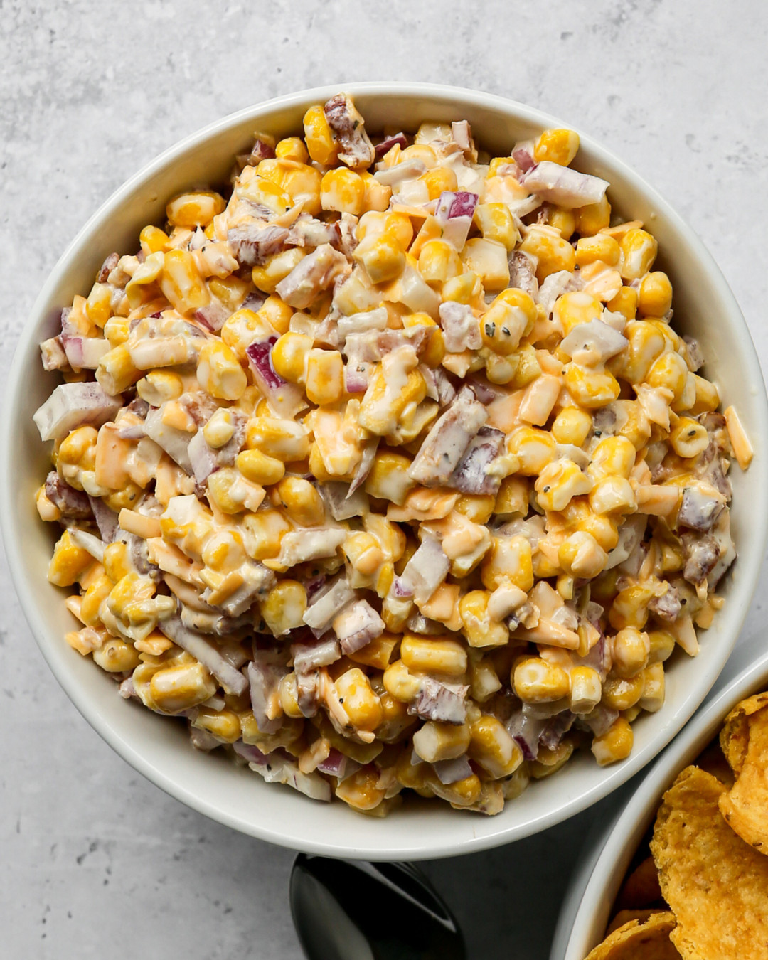 Everything you need to make this Gluten Free Corn Salad with Bacon is right here. The OXO box grater makes shredding the cheddar cheese quick and easy, the cutting board set and Henckels knife are perfect for chopping the bacon and dicing the red onion, and the OXO 3 quart mixing bowl is the ideal size for tossing everything together. The small ceramic bowls are great for serving the salad and the white ceramic chip and dip tray is the perfect way to serve this salad as a dip alongside gluten free corn chips at your next cookout or gathering. Tap to shop everything I used to make this recipe! 

 #LTKdayinmylife #LTKfoodie #LTKHome