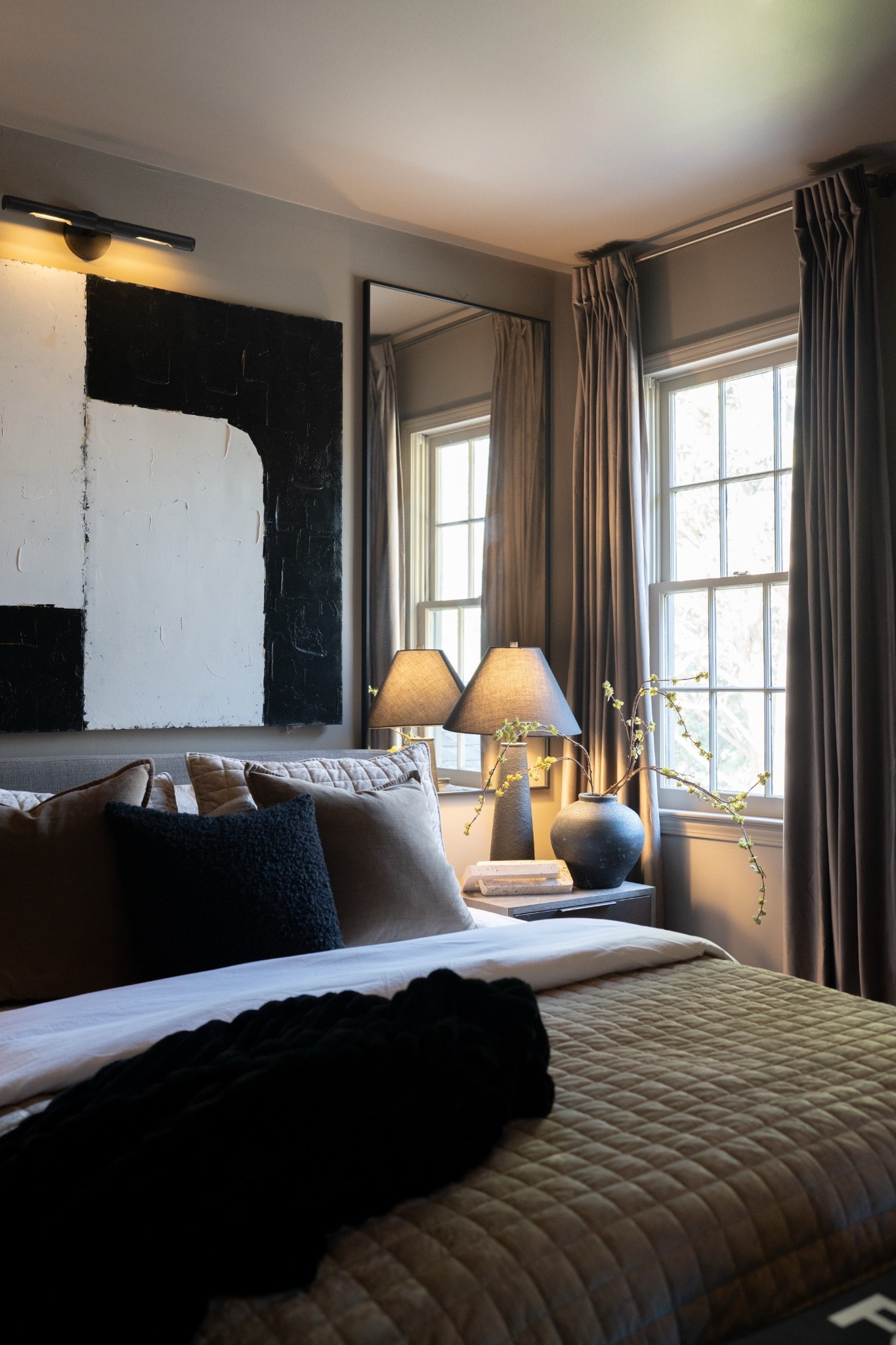 Just sitting here obsessing over this refresh Parker’s room! I switched out the art for the mirror & I love how it reflects light and plays off the boucle bench and rustic planter! I’ll link up the art light and the up light behind the planter! They really make this space magical! XxV 

#LTKHome #LTKdayinmylife #LTKmomlife