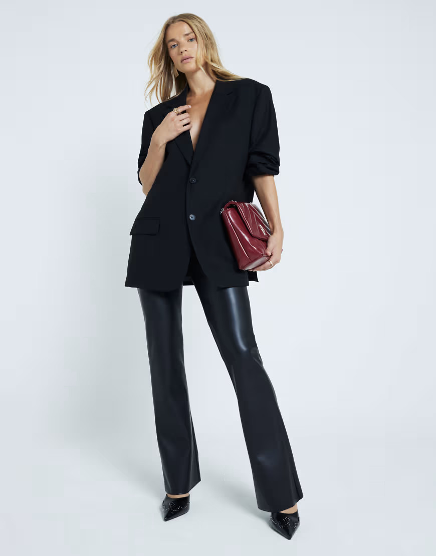 River Island faux leather pull on flare trouser in black | ASOS (Global)