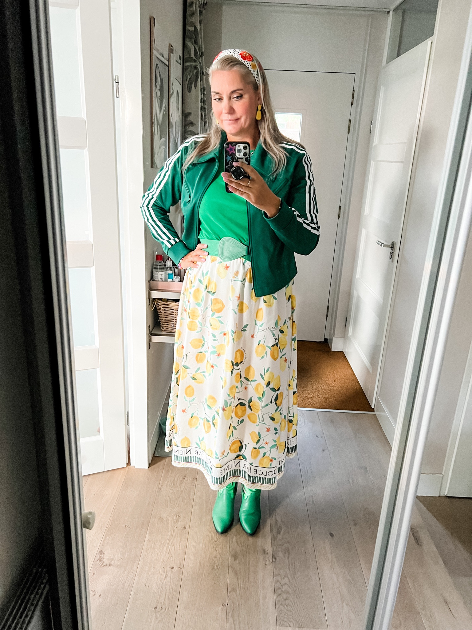 Ootd - Wednesday. Lemon print skirt (on sale), green t-shirt, bottle green Adidas jacket, green elastic belt, green Western boots (old Sacha). Headband is from Namjosh. 



#LTKmidsize #LTKworkwear #LTKeurope