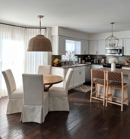 Kitchen and breakfast room. Neutral, round table, target barstools and beautiful lamp, dining chairs and table 

#LTKstyletip #LTKhome #LTKfamily
