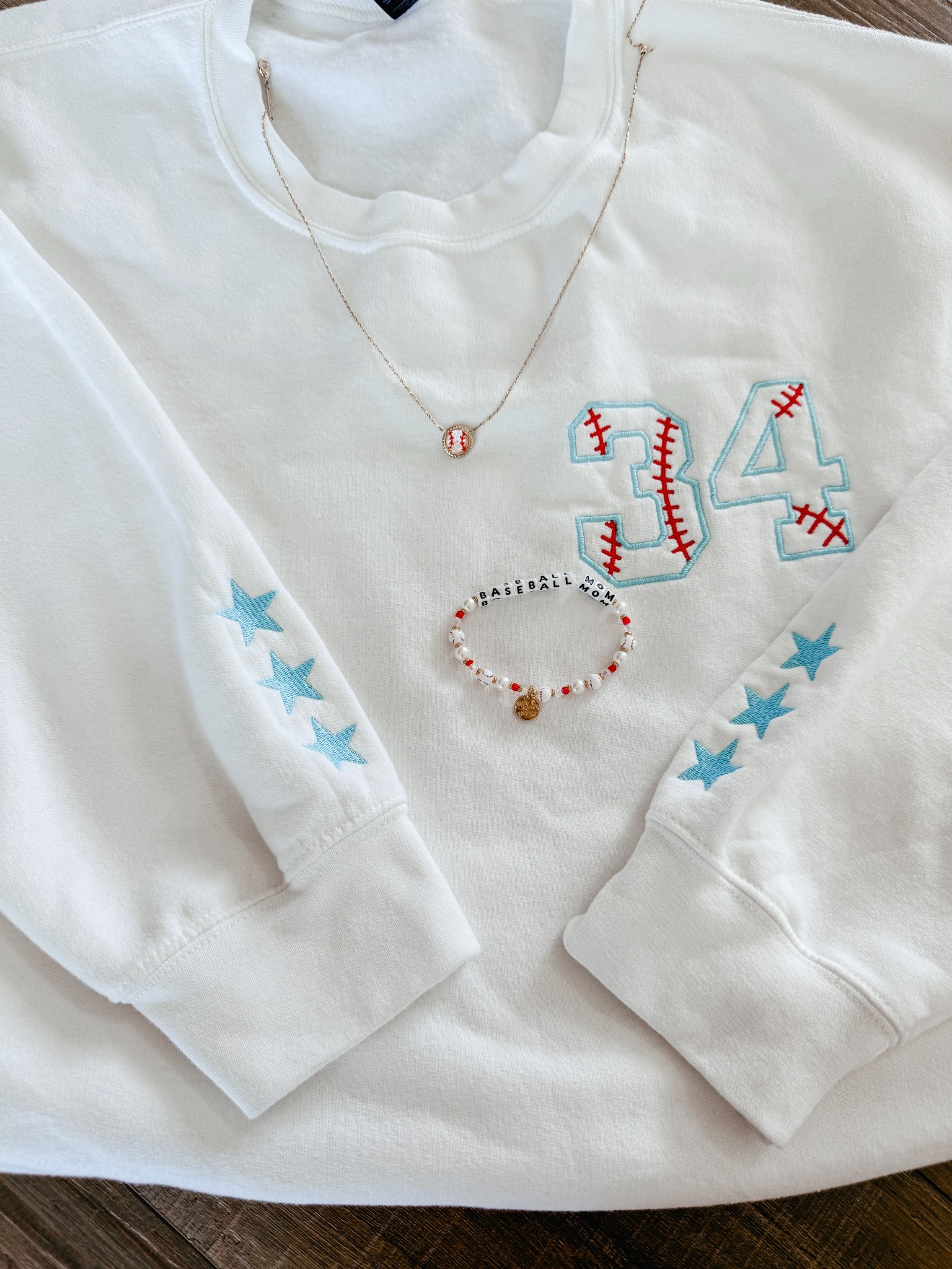 Mother’s Day gift ideas! This one is for the baseball mom! These custom sweatshirts are a 10/10! I get compliments every time I wear this! The fun bracelet and necklace are perfect too! 

Baseball mom 
Mother’s Day gift guide 
Little words project 
Kendra Scott 

#LTKGiftGuide #LTKSaleAlert #LTKWatchNow