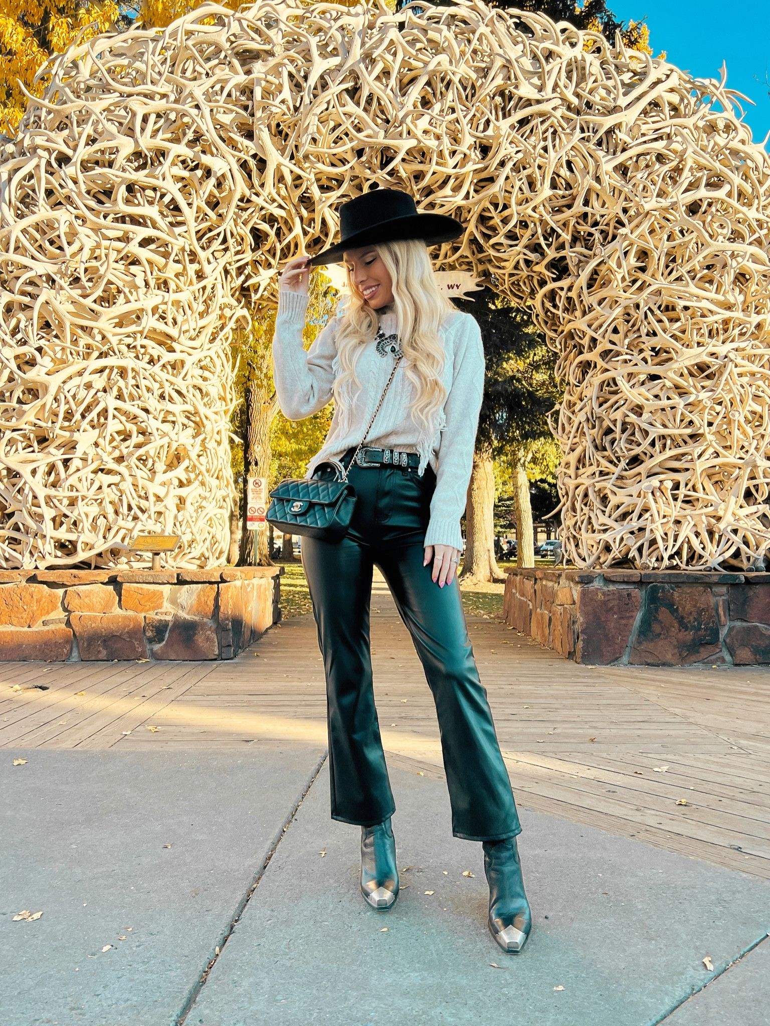 Faux leather pants. Fall outfit. Fringe sweater. Black western hat. Western booties. Jackson hole 

#LTKtravel #LTKshoecrush #LTKSeasonal