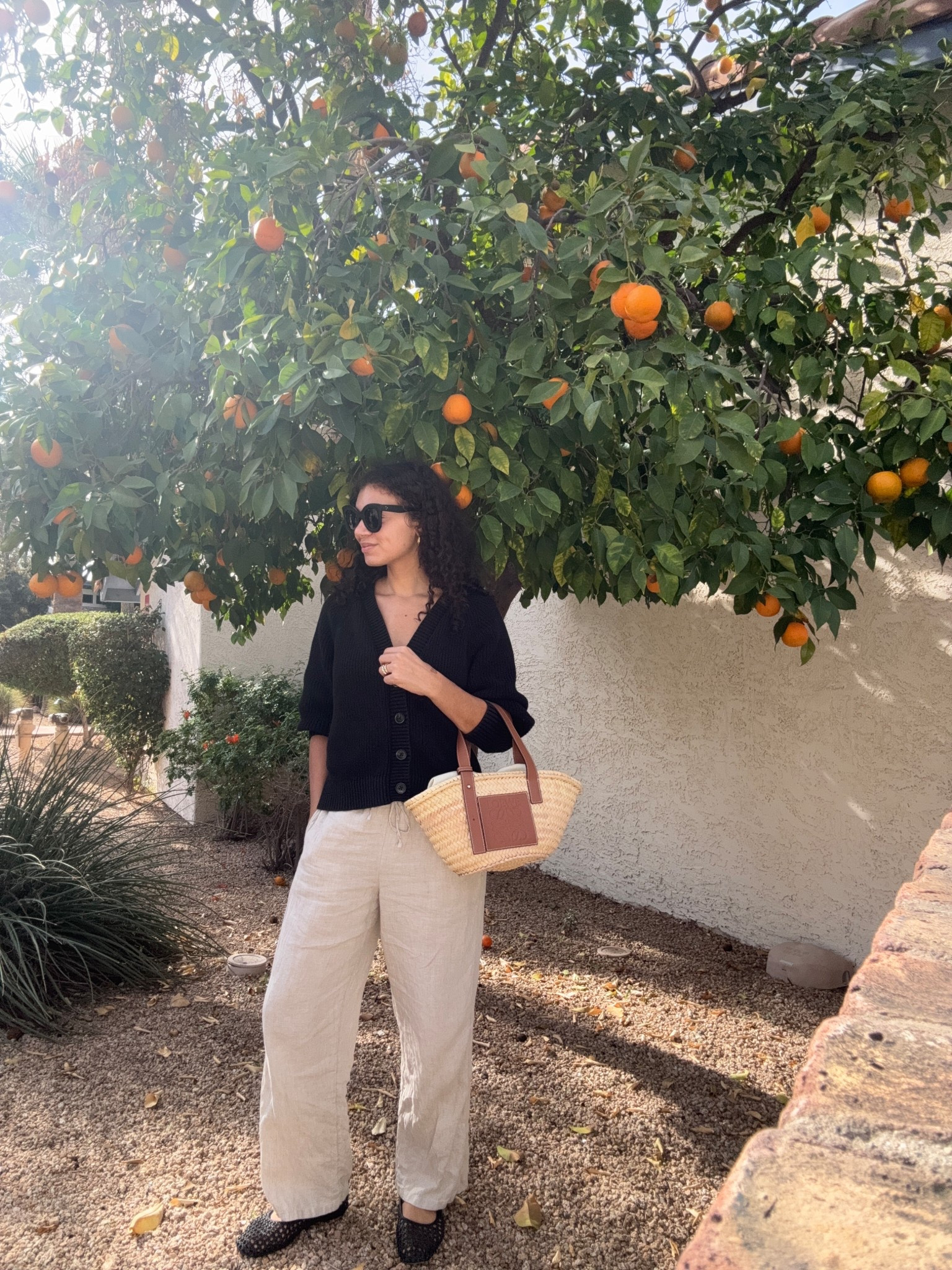 Whether you experience warmer winters or need a vacation outfit idea, pair your linen pants outfit with a chunky cardigan and woven flats for a stylish look 

#LTKTravel