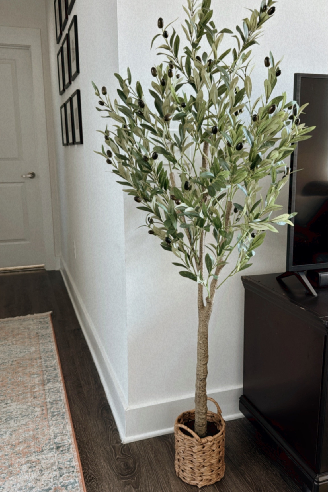 Faux olive tree in basket! Approx 59” tall! 

#LTKfindsunder100 #LTKhome