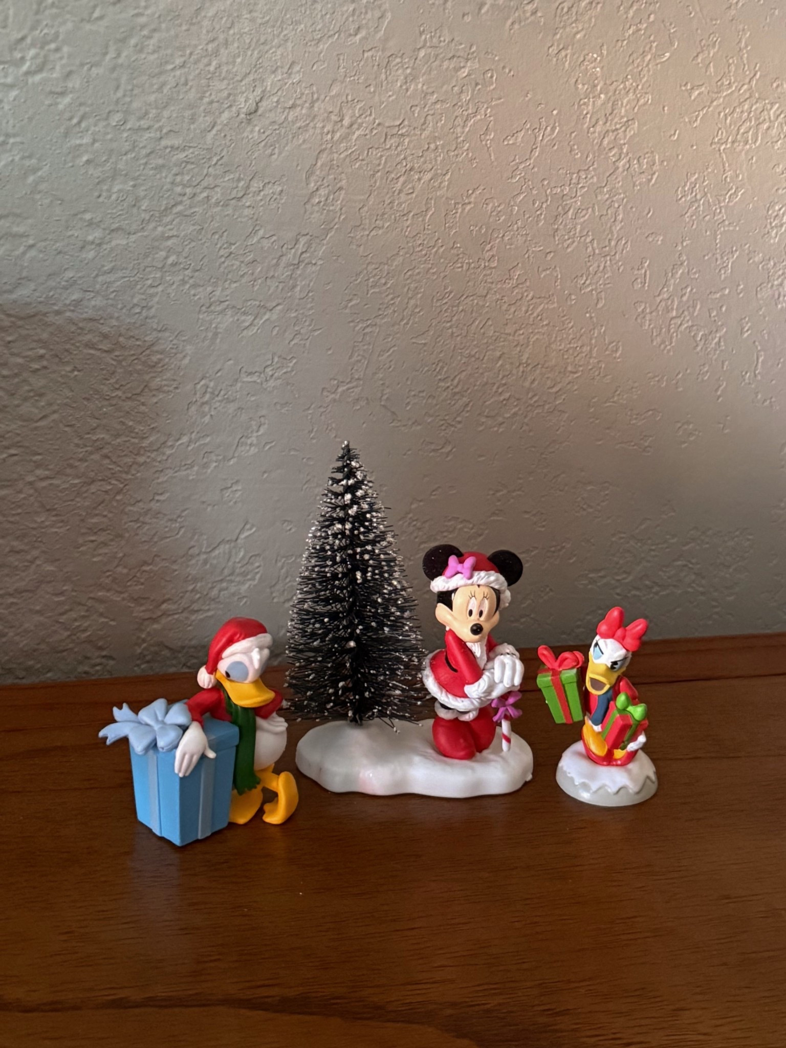 Walmart has the cutest Disney Christmas villages and figurines! I have to go back and grab more 😍