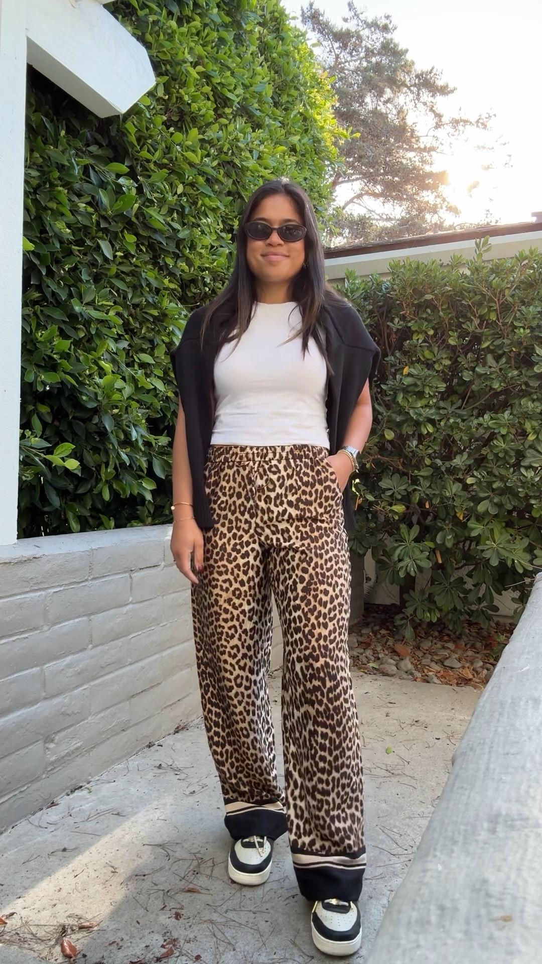 These leopard pull on satin-ish pants are so cute and comfy! Comes in other colors and under $20! Runs TTS, wearing a small! Also this black sweater is a closet staple! Amazing quality, lots of colors and only $50! 

#LTKStyleTip #LTKFindsUnder50 #LTKSeasonal