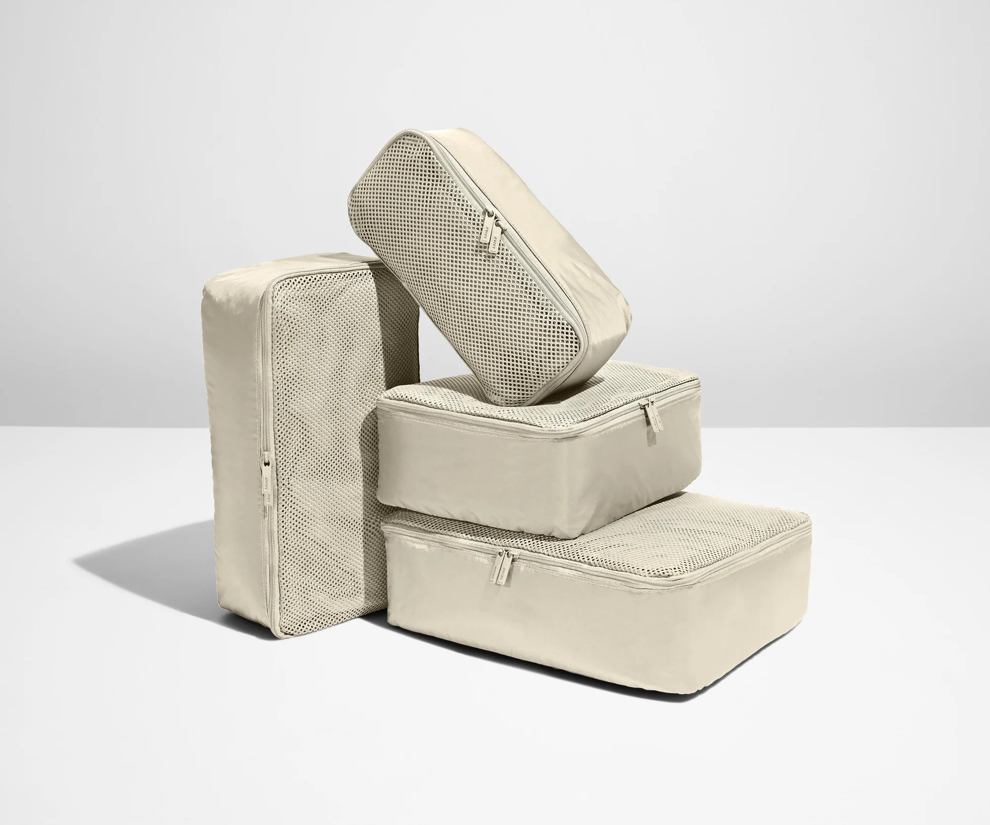 The Insider Packing Cubes in Ruby Haze & Glacial Pink | Away