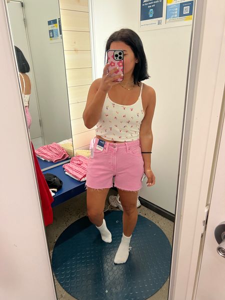 Loving pink denim and these shorts are so cute for summer - wearing size 2, size up one size for a baggier fit (in my opinion), can’t find the rank online to link but it has a built in bra 

#LTKFindsUnder100 #LTKSaleAlert #LTKFindsUnder50