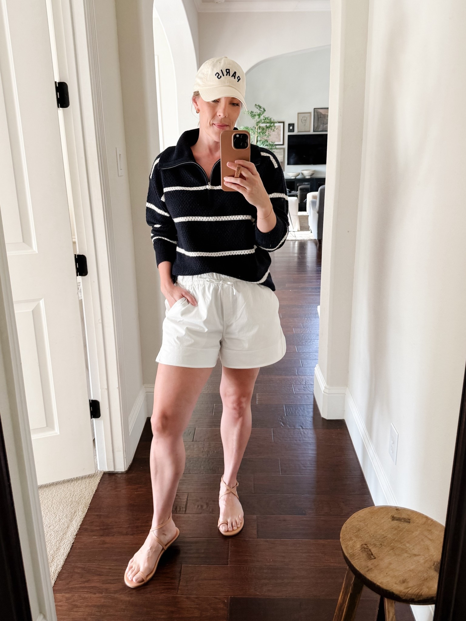 Casual Summer outfit idea: Navy stripe half-zip pullover sweater, white shorts, nude sandals, and baseball cap



#LTKOver40 #LTKMidsize