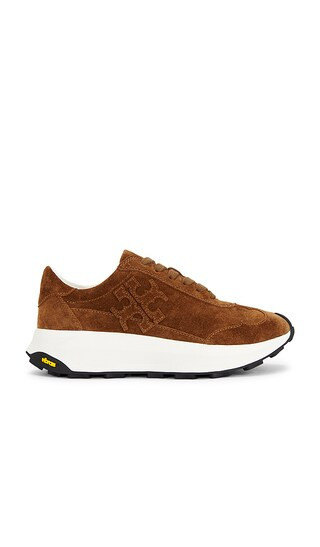 Tory Burch Tory Sneaker in Brown. - size 7.5 | Revolve Clothing (Global)