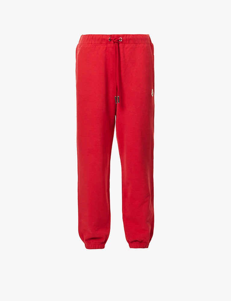 Logo-embroidered tapered cotton jogging bottoms | Selfridges