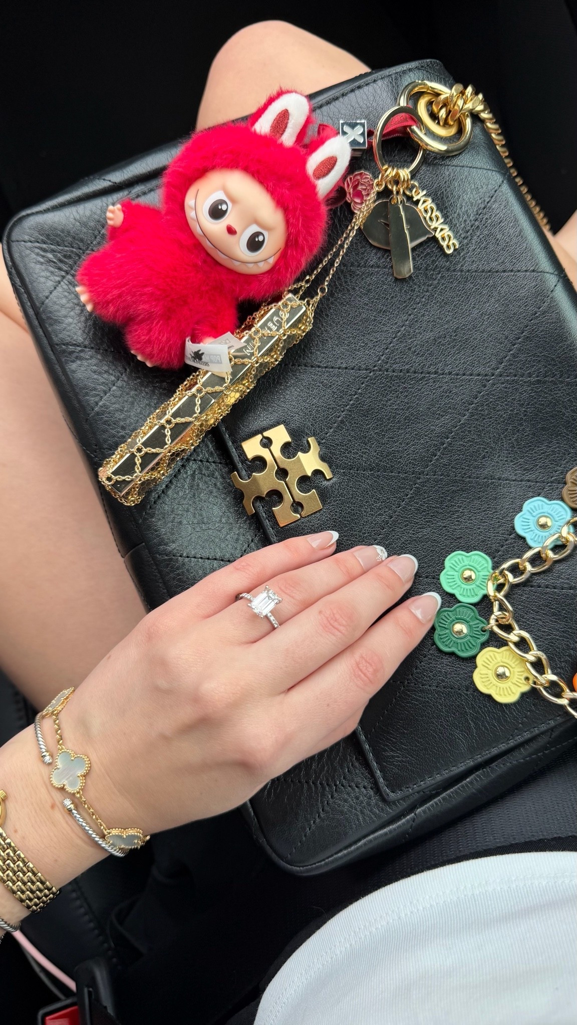Tory Burch Charlie bag
Mini Labubu 
Lipstick chain holder