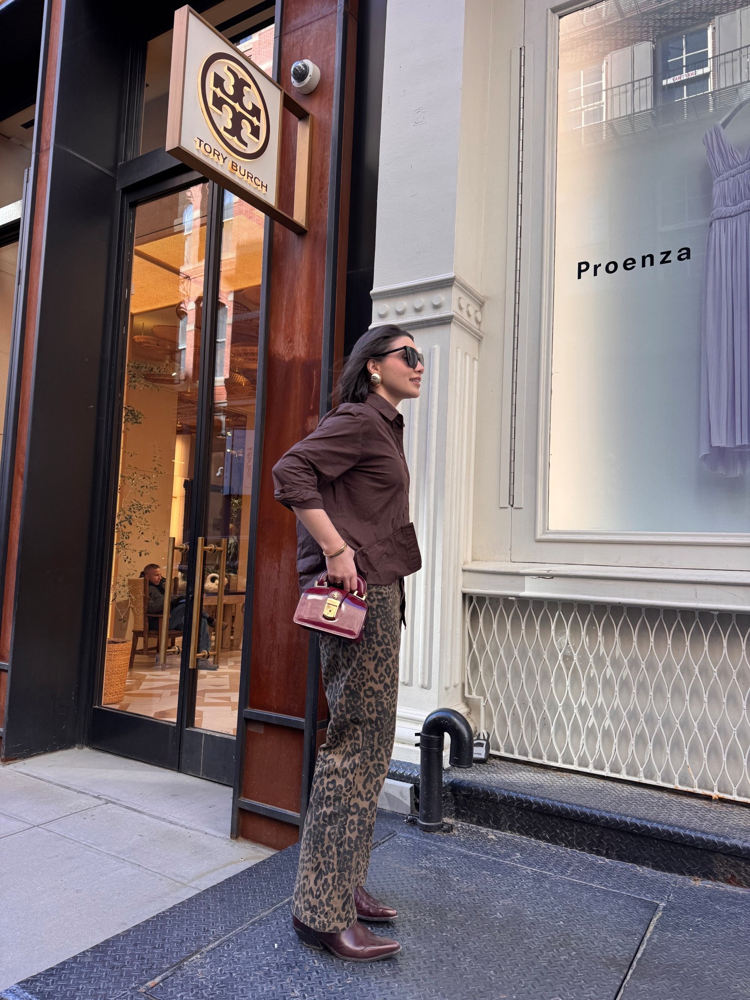 Leopard print pants with brown top and pop color handbag 

#LTKSeasonal #LTKFestival #LTKSpringSale