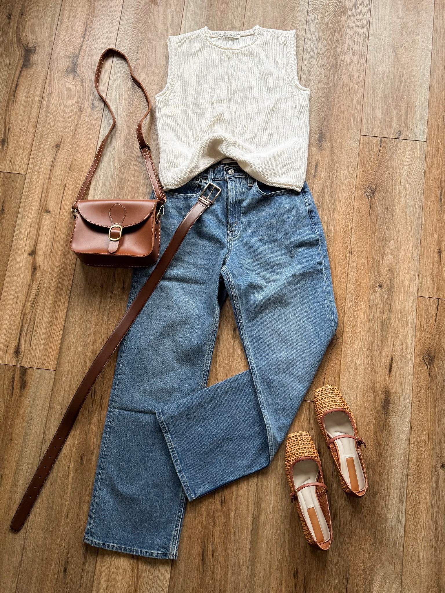 abercrombie outfit. abercrombie 90s relaxed jeans in the medium wash (first medium option) abercrombie sweater tank top and abercrombie belt (color cocoa) 

spring outfit ideas. spring shoes. casual everyday outfits. 

#LTKootd #LTKSaleAlert #LTKSeasonal