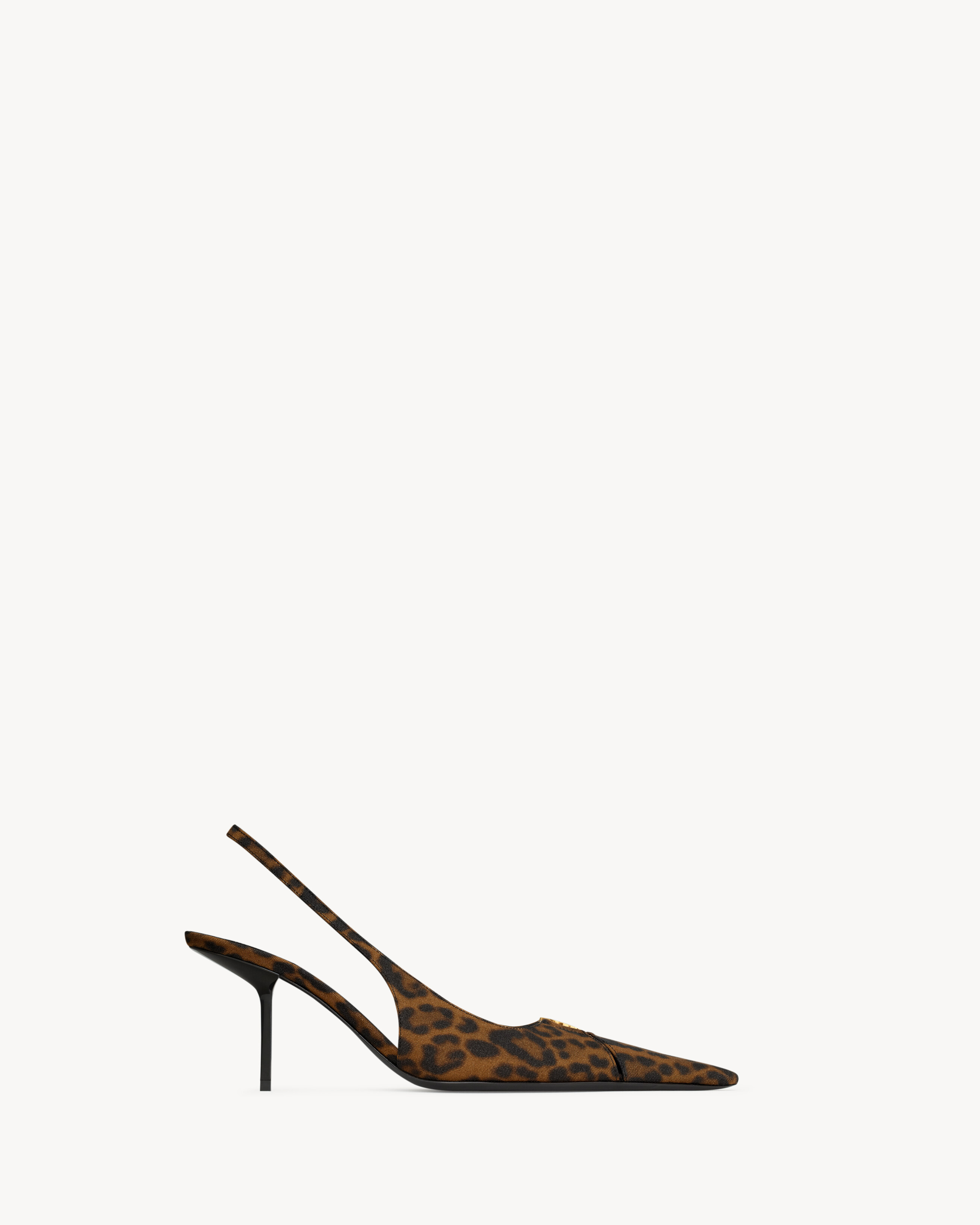 slingback pumps with a low stiletto heel and cut-out elongated toe decorated with the CASSANDRE. | Saint Laurent Inc. (Global)