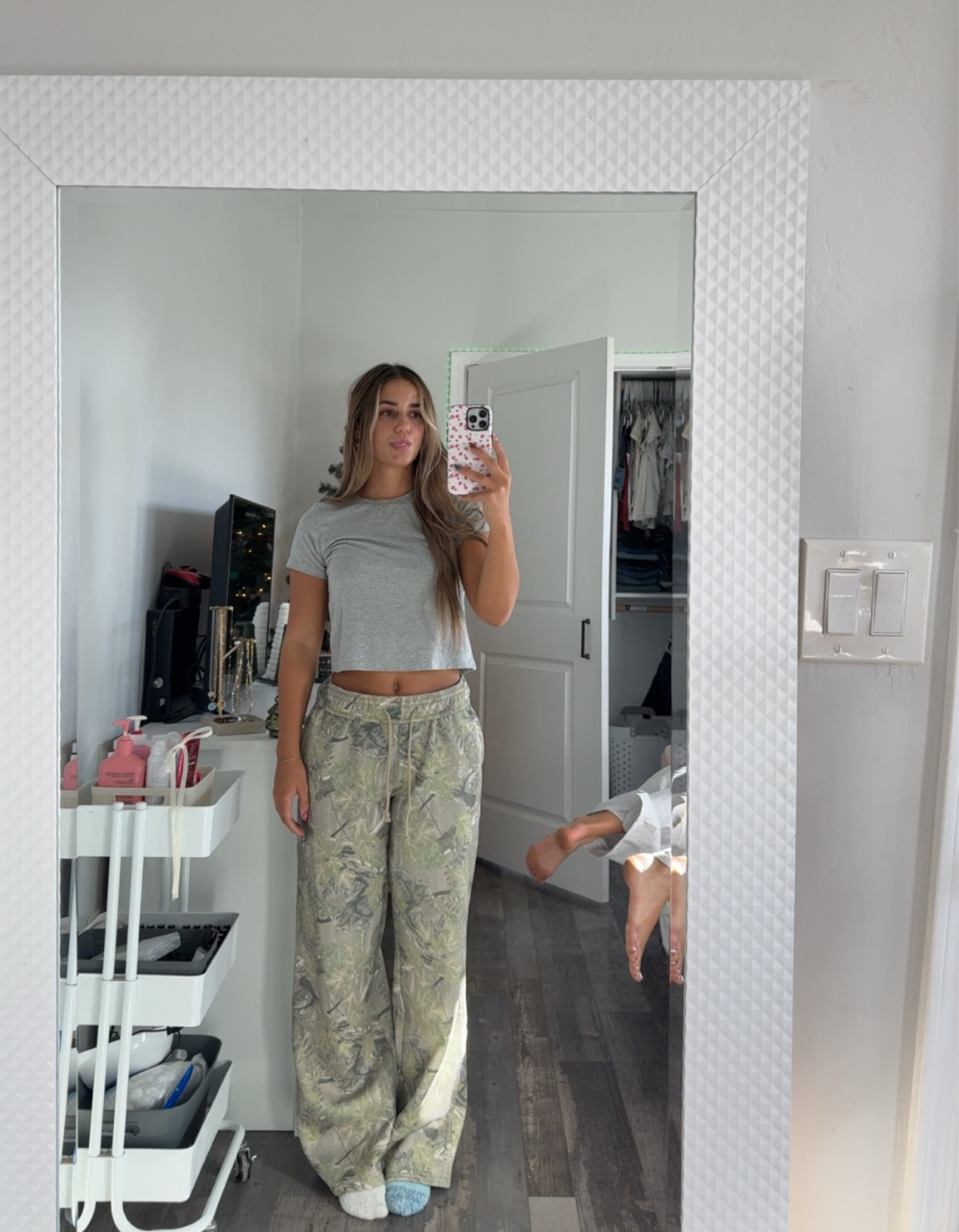 Camo sweats and grey shirt
Wearing size small for both 
