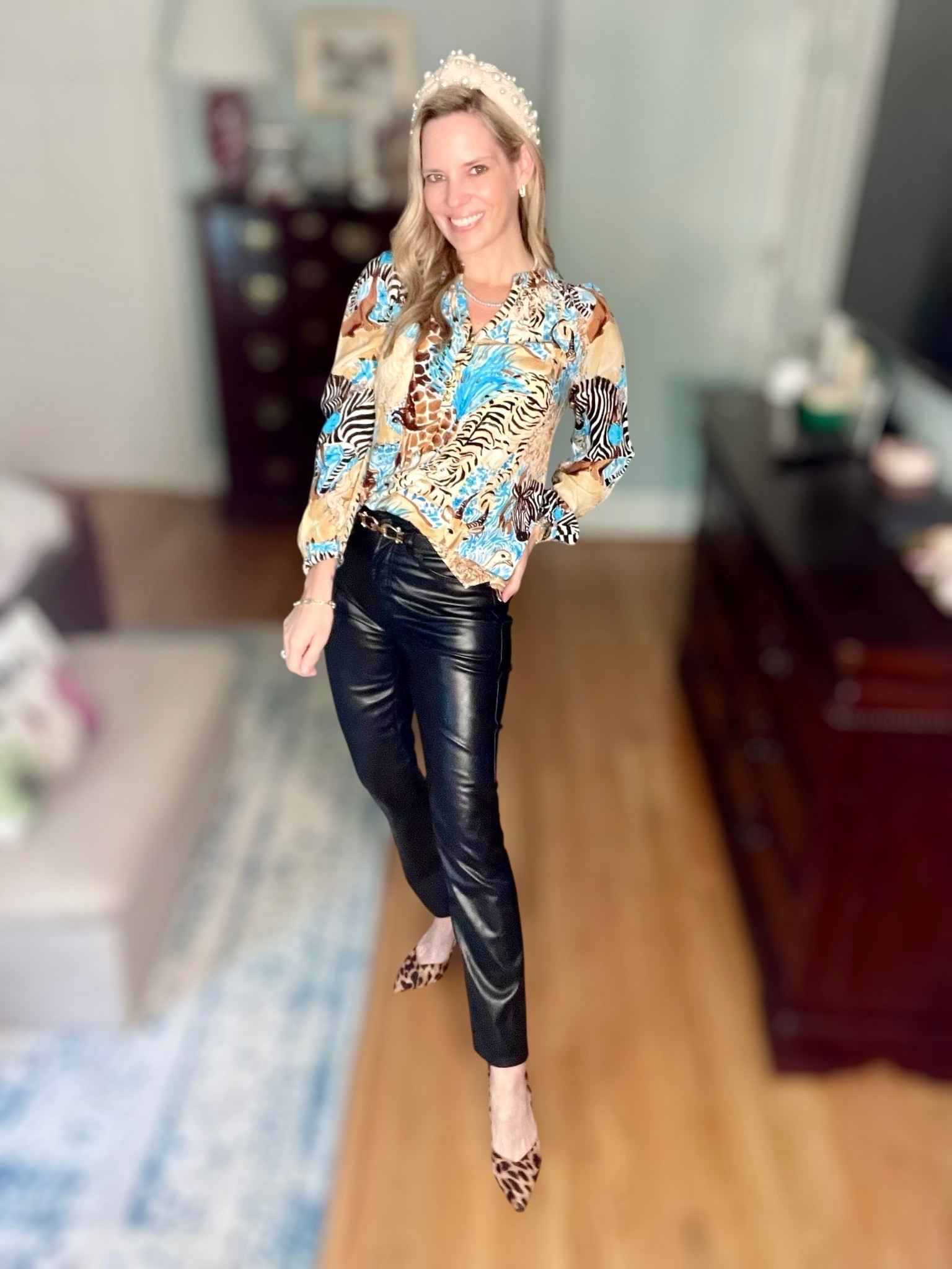 Elevated glam meets edgy chic ✨ I styled my Lilly Pulitzer Elsa silk blouse (wearing XS) in a vibrant animal + tropical print with sleek black vegan leather pants for a night-out ready look. The mix of bold pattern and luxe texture makes this outfit perfect for fall events, date night, or a stylish girls’ dinner. I added a pearl knotted headband for a feminine touch and finished with leopard print pointed toe pumps for the ultimate statement shoe 🐆. Accessorized with gold tennis jewelry, chain bracelets, and layered necklaces from Melinda Maria Jewelry (use code PREPPYREBEL for 10% off + free gift 🎁).

📌 Style tip: Balance a statement blouse with sleek leather pants and bold accessories for an effortlessly polished look.

Lilly Pulitzer Elsa silk top XS, black vegan leather pants outfit, leopard print heels, pearl headband style, fall date night outfit ideas, chic dinner outfit, trendy animal print blouse, Melinda Maria jewelry discount code PREPPYREBEL.


#LTKFindsUnder100 #LTKShoeCrush #LTKOver40