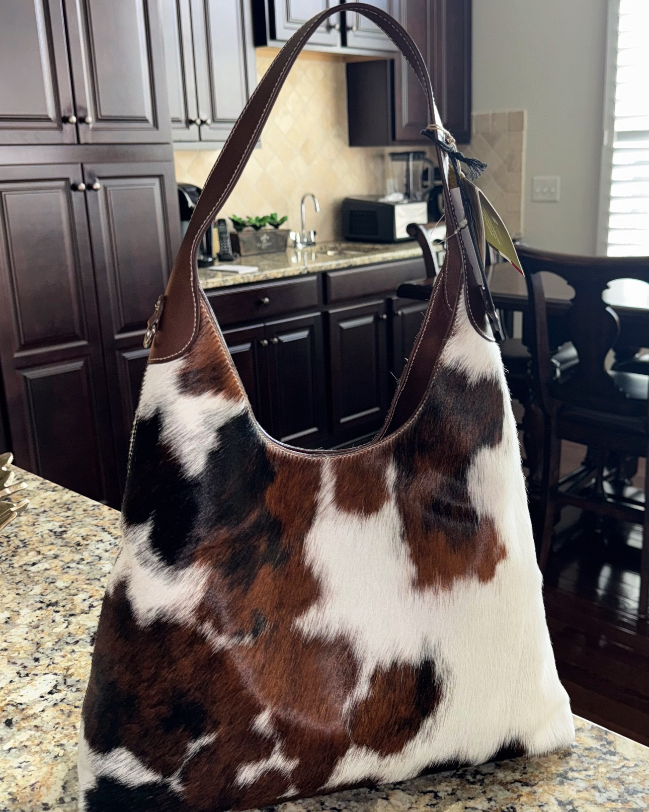 TJ Maxx/ Marshall’s Viral Bag 

CAVALCANTI
Made In Italy Leather Hobo

Link: https://m.marshalls.com/us/m/jump/product/Made-In-Italy-Leather-Hobo/4000391969 (SOLD OUT BUT RESTOCKS)

Product Details
haircalf finish, top carry handle, contrast lined interior, silver tone hardware, brand logo accent
17in W x 15in H
magnetic disc closure
1 interior zip pocket, 1 interior magnetic disc pocket leather
imported, made in Italy style #:4000391969

#LTKSaleAlert #LTKStyleTip #LTKSeasonal