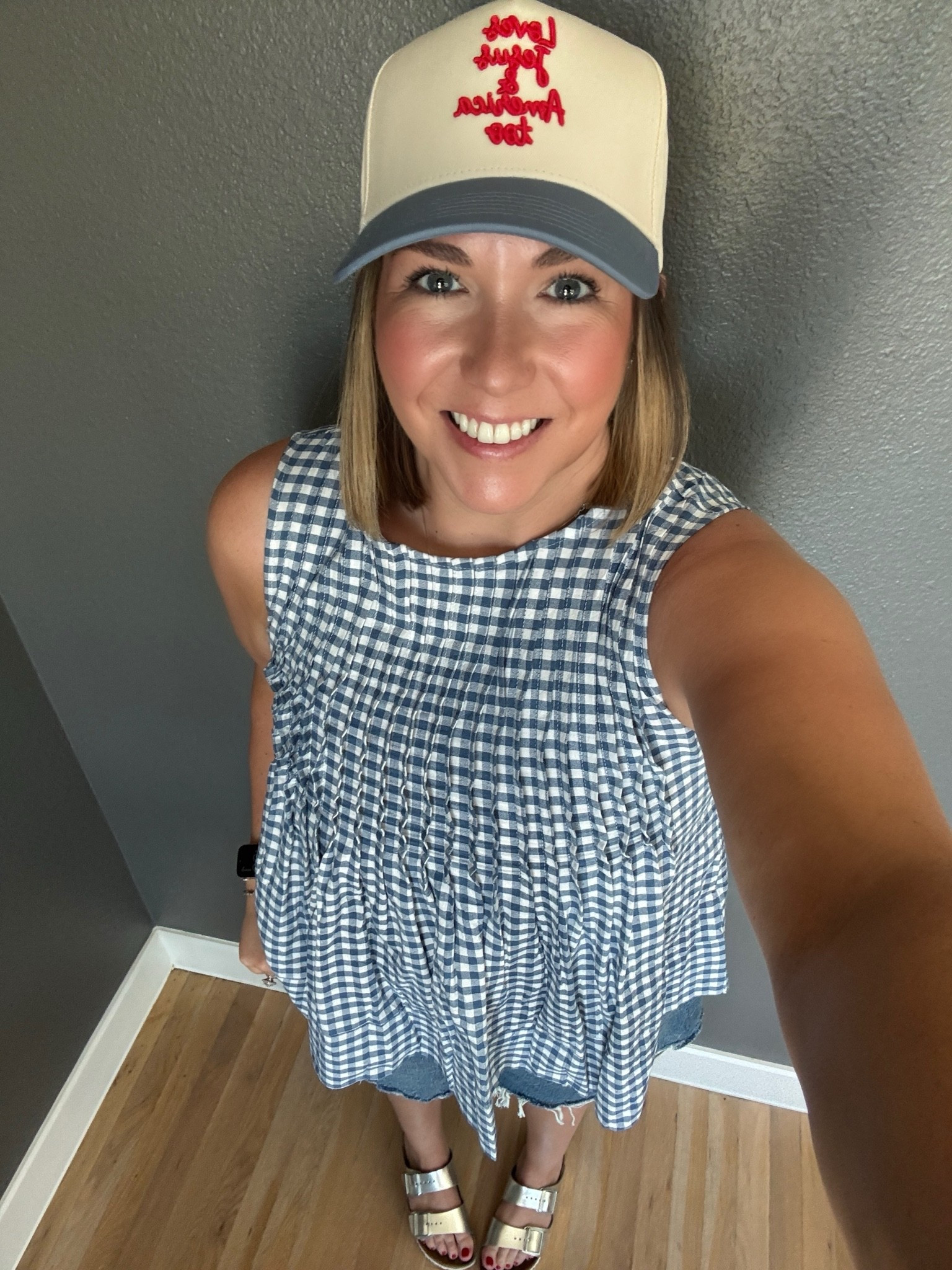 Americana dressing is in full force. I’m also really into gingham this summer. This top comes in so many colors and it so easy to wear. I added my new hat and was ready to go.

#LTKootd #LTKMidsize #LTKSeasonal