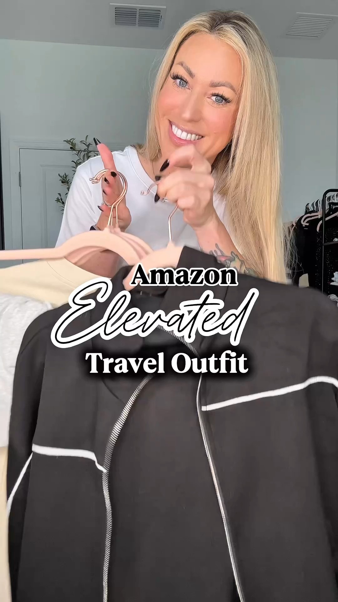 Travel Plans?! You need this track suit!The black and white pinstripe tracksuit from Amazon is such a vibe 🖤✨ *If your dog sheds like mine don’t choose black 🤣👀 

It’s comfy like loungewear but looks totally elevated — the wide-leg pants, subtle pinstripe detail, and the metal zipper on the jacket make it feel polished and put together.

This is my go-to kind of outfit for travel, errands, or casual days when I still want to look chic. You can dress it up with heels or keep it casual with sneakers — it works either way.

✨ Linked on my LTK + Amazon storefront
✨ Save this for your next travel outfit inspo
✨ Tap to shop the full tracksuit below 

#amazonfashion #amazonfinds #tracksuitstyle #athleisurewear #ltkfashion #ltkstyle #traveloutfit #elevatedbasics #widelegpants #momstyleover30
#holidaytravel 

#LTKTravel #LTKHoliday #LTKFindsUnder50