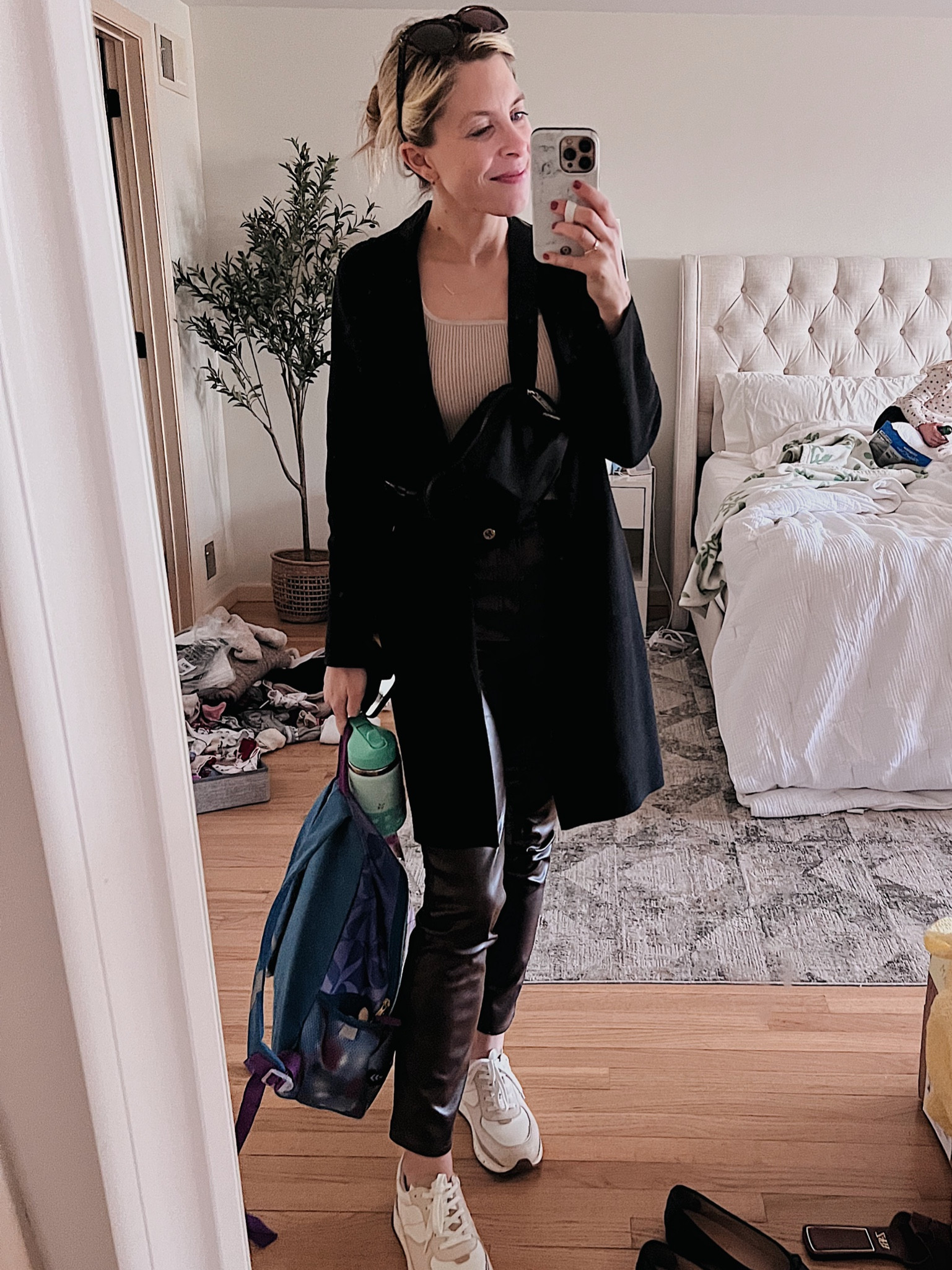 Wearing an XS in the top and 24 Regular in the pants. I’m happy with the length and kept the regular vs petite  