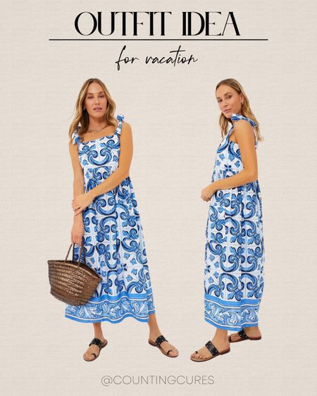 Love this gorgeous blue patterned sleeveless maxi dress, sandals, brown rattan bag, and more! This outfit idea is perfect for your next vacation trip this Spring or Summer!
#springfashion #resortwear #transitionalstyle #trendydresses

#LTKstyletip #LTKSeasonal #LTKitbag