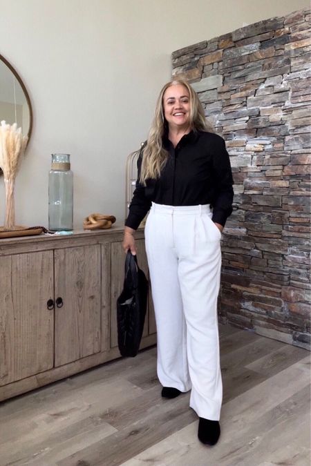 Business outfit/ workwear/ office outfit 
White trousers, black tailored shirt / universal standard 
Black Vince Camuto bag, Amazon bag, nude sandals. 



#LTKworkwear #LTKcurves #LTKitbag