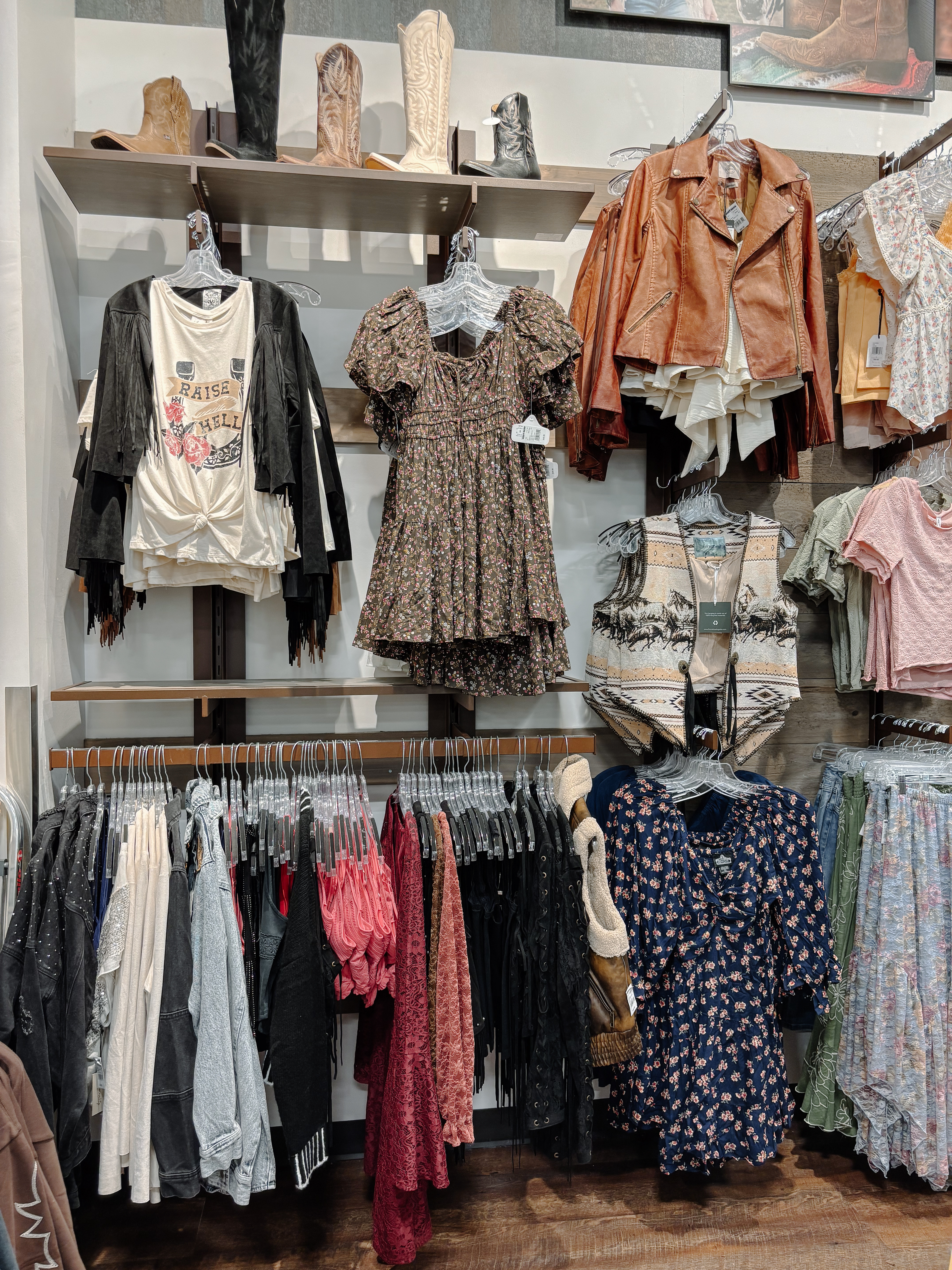 First time at Boot Barn and I’m officially obsessed 🤠 From cowboy hats to western boots, cow print, pretty florals, and colorful patterns, this store was full of surprises. I went in just to exchange a hat (big head girl problems 🙋‍♀️) and left with a Pinterest board full of western outfit ideas for fall. If you love cowgirl boots, cowboy hats, or western-inspired style, this one’s for you! 

 #LTKFindsUnder100 #LTKStyleTip #LTKShoeCrush