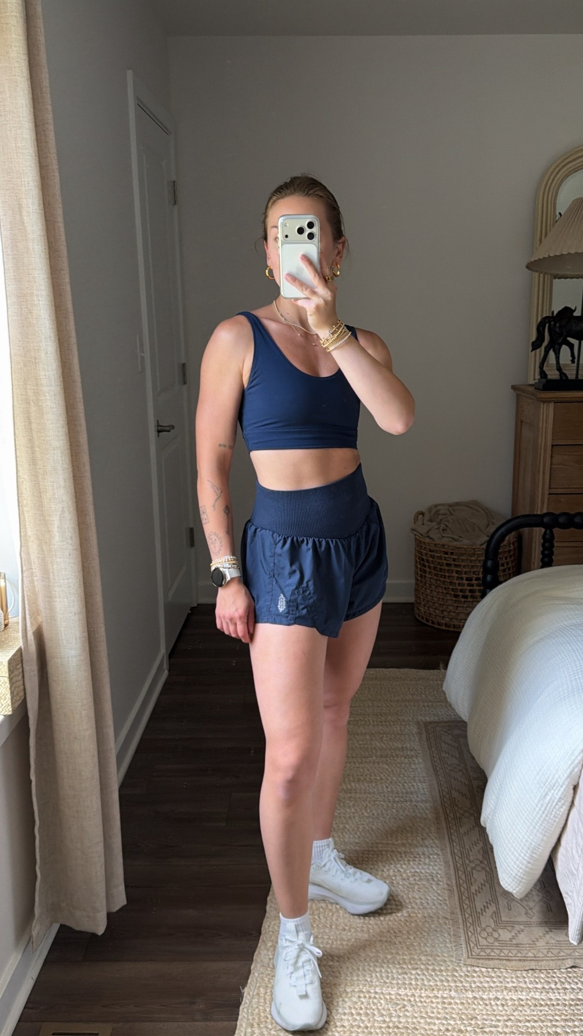5/31/26 Walking Outfit Details

Today’s walk outfit 🤍 wearing a navy Free People Movement shorts set with my Garmin, Amazon socks, and the sneakers I keep reaching for on long walks. Comfortable, supportive, and easy for everyday movement—everything is linked here ✨

#LTKfitnessgoals #LTKActive #LTKootd