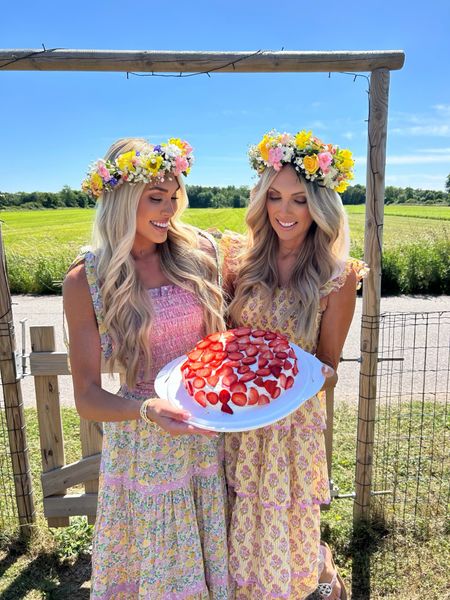Celebrate summer like we did in Sweden with the traditional strawberry cake and pastel maxi dresses.  (My yellow tiered dress was from Saylor 2023 Pink Lemonade print. Google for options.) 

SWEDISH STRAWBERRY CAKE 

For the cake: 
1 cup unsalted butter, softened
1 cup sugar
1/4 cup light brown sugar
4 large eggs
1 Tablespoon vanilla extract
3 cups sifted all-purpose flour
1 Tablespoon baking powder
1/2 teaspoon salt
1 cup  buttermilk

For the cream cheese frosting:
8 ounces full-fat brick style cream cheese, softened 
1/2 cup unsalted butter, softened 
3 cups (350g) confectioners’ sugar
1 – 2 Tablespoons heavy cream
1 teaspoon vanilla extract
1 pinch salt


For the filling:
1/2 cup  strawberry jam
2 cups fresh strawberries

Instructions
Preheat the oven to 350°F Grease and lightly flour two cake pans. 

 Mix butter until creamy. Add both sugars, eggs, vanilla, and beat on medium speed until everything is combined. 

In a large bowl, mix together the flour, baking powder, and salt. Slowly add the dry ingredients to the wet ingredients. Add the milk. 

Bake for about 25 minutes or until a toothpick inserted in the center comes out clean. Remove from the oven and allow to cool completely before assembling the cake.

For the frosting:

Beat cream cheese and butter together. Add confectioners’ sugar, 1 or 2 Tablespoons cream, vanilla extract and salt. 

For the filling and assembling the cake:

Trim the tops off the cake layers to create a flat surface. Evenly cover one layer with the jam, then add a layer of sliced strawberries, and one layer of cream cheese frosting. Do the same with second layer then cover the entire top with strawberries. 

#LTKStyleTip #LTKFamily #LTKTravel