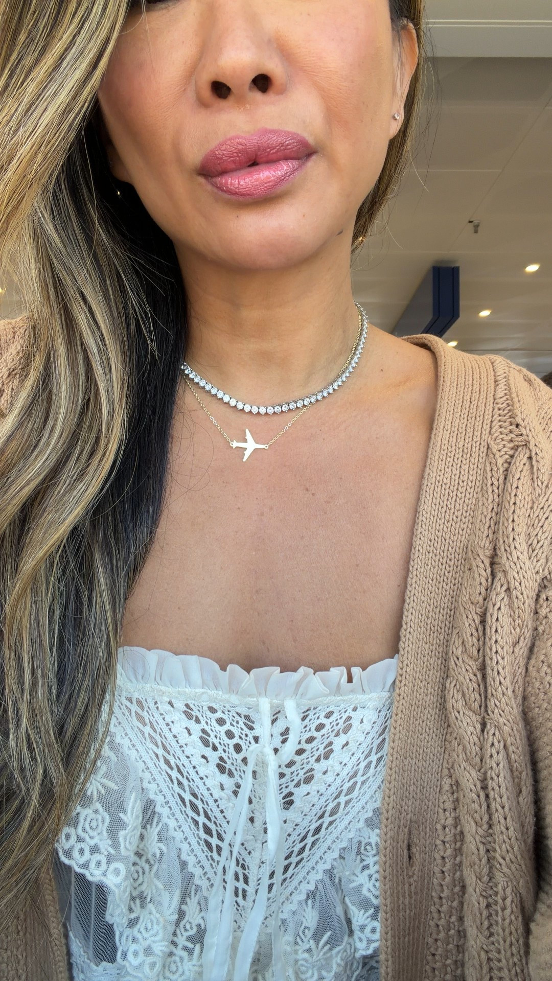 Tennis necklace and airplane charm necklace. Amazon finds that are gold plated and great quality. Holiday gifts under $50. Best gifts. Linked sweater and lace top too 

#LTKFindsUnder50 #LTKHoliday #LTKGiftGuide