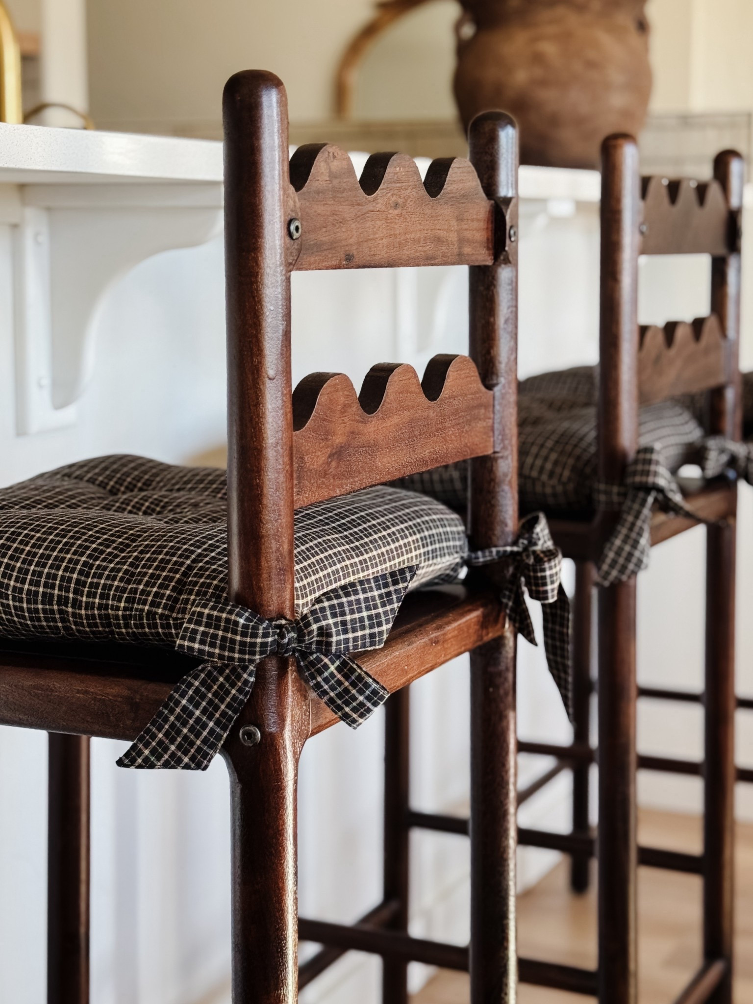 Scalloped counter stools chair cushions

#LTKHome #LTKSaleAlert