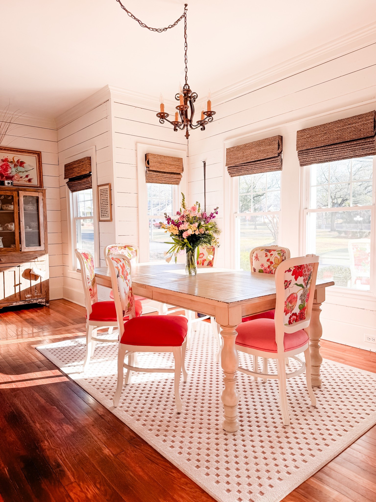 Spring morning in my colorful dining room. Add a cozy rug under the table to complete the look. Colorful chairs from @chairwhimsy truly top of this colorful, dining room space  

#LTKHome #LTKSpringSale #LTKSaleAlert
