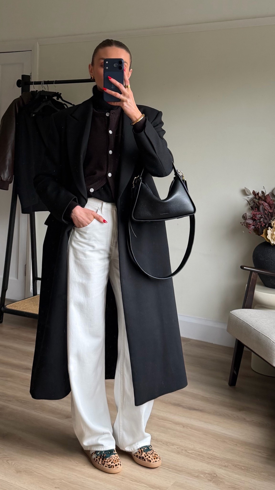 Coat is older from Sandro, a sale purchase a few years ago, I’ve linked similar
Brown cardigan. Exact is from The Gather, can’t link on here but EmilyJ15 for 15% off https://thegather.shop/discount/EmilyJ15

Uniqlo white baggy curve jeans W23 L31 
I’m 5ft 6 
Adidas spezial leopard print 
The horse bag 