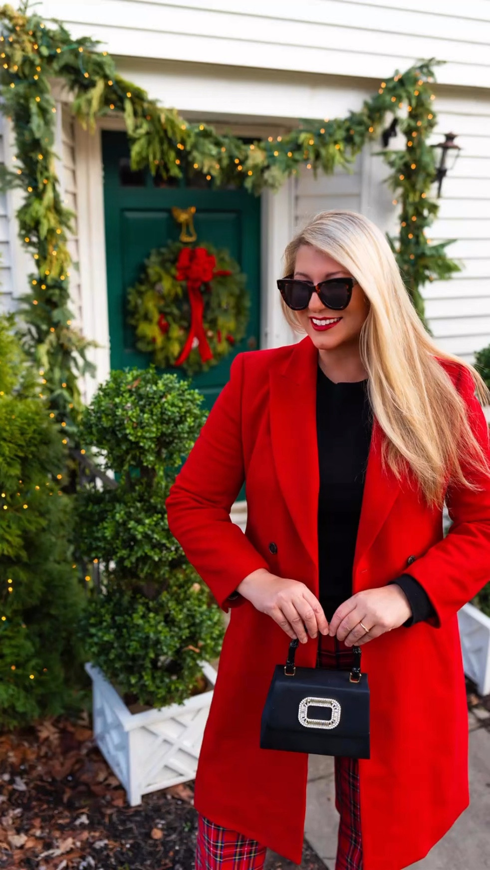 What I am wearing for one of our favorite holiday traditions. Red tartan pants, black fitted sweater, red wool coat, & a cute black evening bag. Coat is last season but I’ll link similar.

#LTKOver40 #LTKHoliday #LTKWatchNow