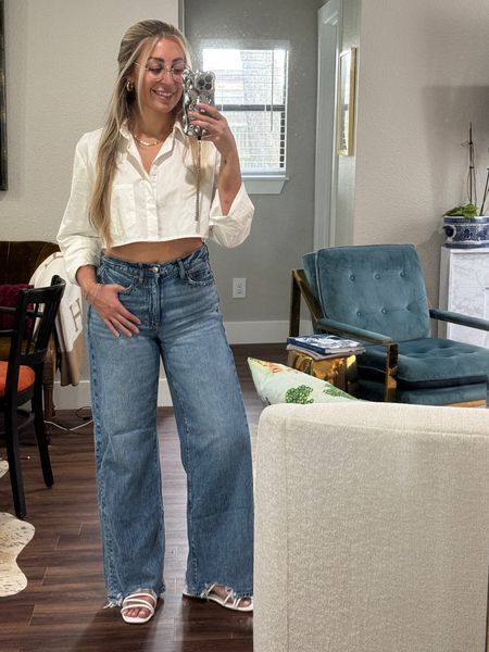 Classic yet modern look for spring! 
Like white button downs? This cute cropped one is perfect for a more modern take. High waisted, baggy jeans are also an alternative take on the straight leg trend. I am also loving these white sandals! All true to size! 

#LTKfindsunder50 #LTKfindsunder100 #LTKSeasonal