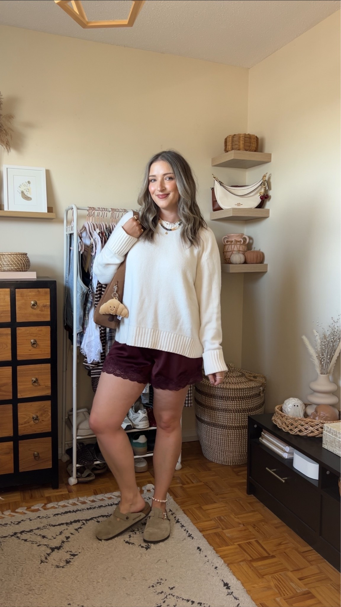 Comfy early fall outfit! Sized up to XL in the sweater for an oversized fit. Wearing M in the satin lace shorts. I’m a 9.5-10 shoe and wear a 40 in the Birkenstock clogs

#LTKfall #LTKstyletip #LTKsale