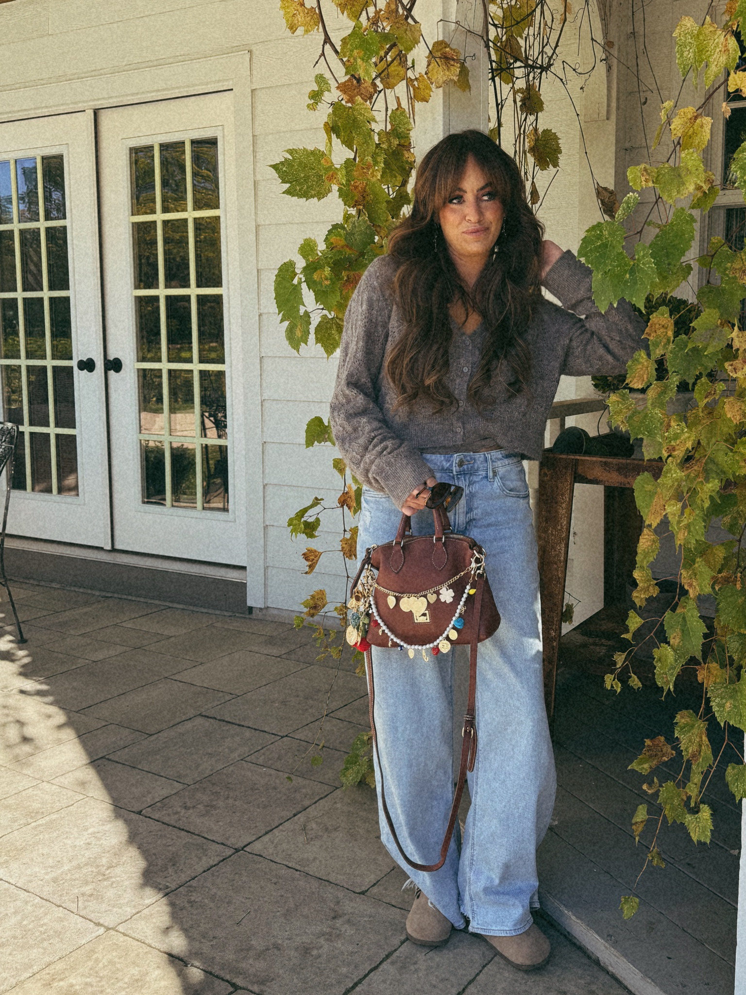 Cozy fall mom fit: wide leg jeans that are so cozy you could wear them to bed. Oh, and a lot of purse charms of course. 

#LTKSaleAlert #LTKGiftGuide #LTKSeasonal