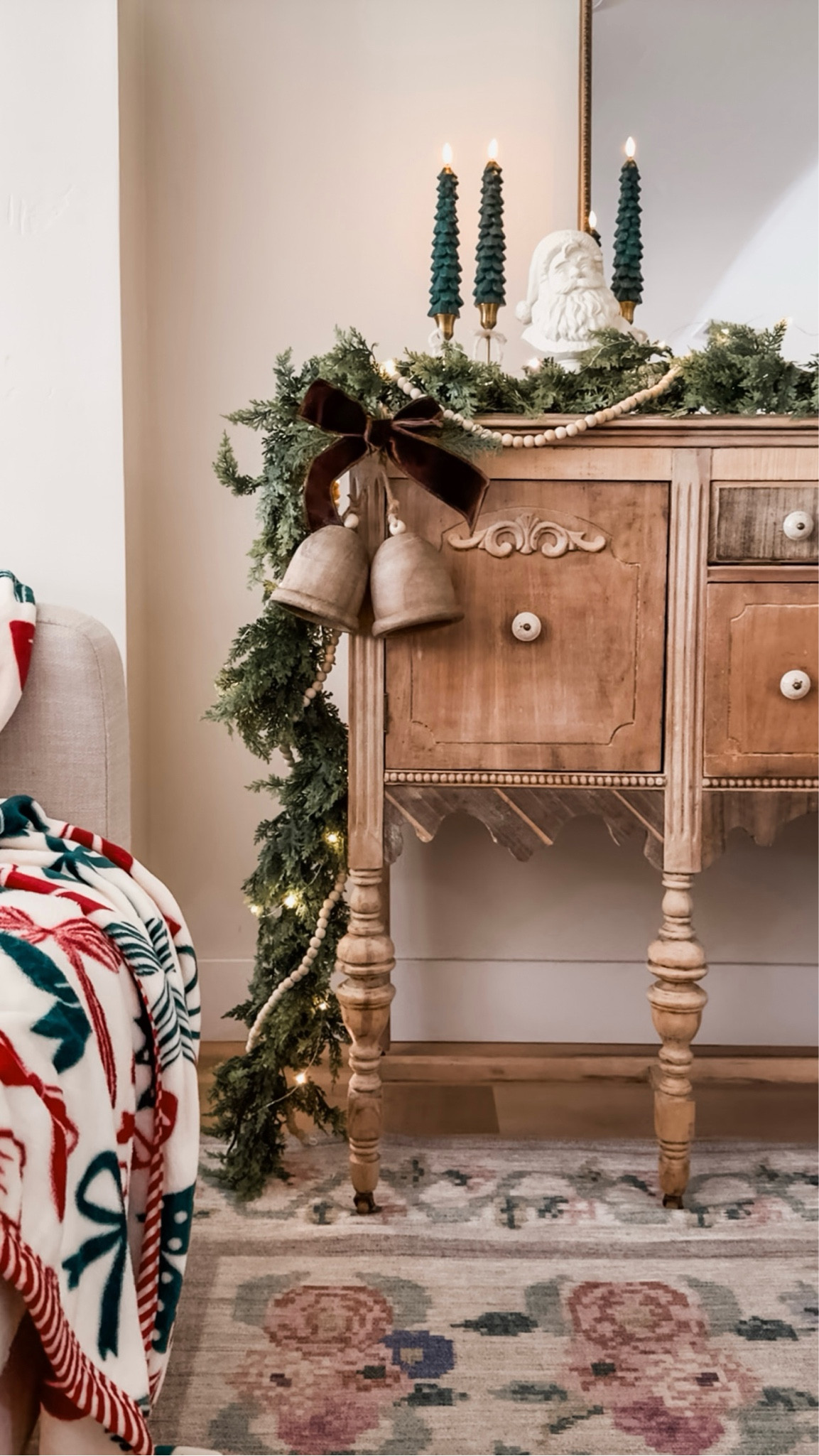 Cozy season decorating starts here 🤍🌲✨ This real touch cedar garland brings instant cozy holiday vibes. Looks like fresh greenery without the mess.

In love with softest bow Christmas throw and these gorgeous brass candlesticks filled with tree candles 🛒

#christmas2025 #realtouchgarland #cedargarland 🌲 Christmas living room decor | cozy home | aesthetic Christmas | cozy at home | Christmas garland decor

#LTKHoliday #LTKFindsUnder50 #LTKSeasonal