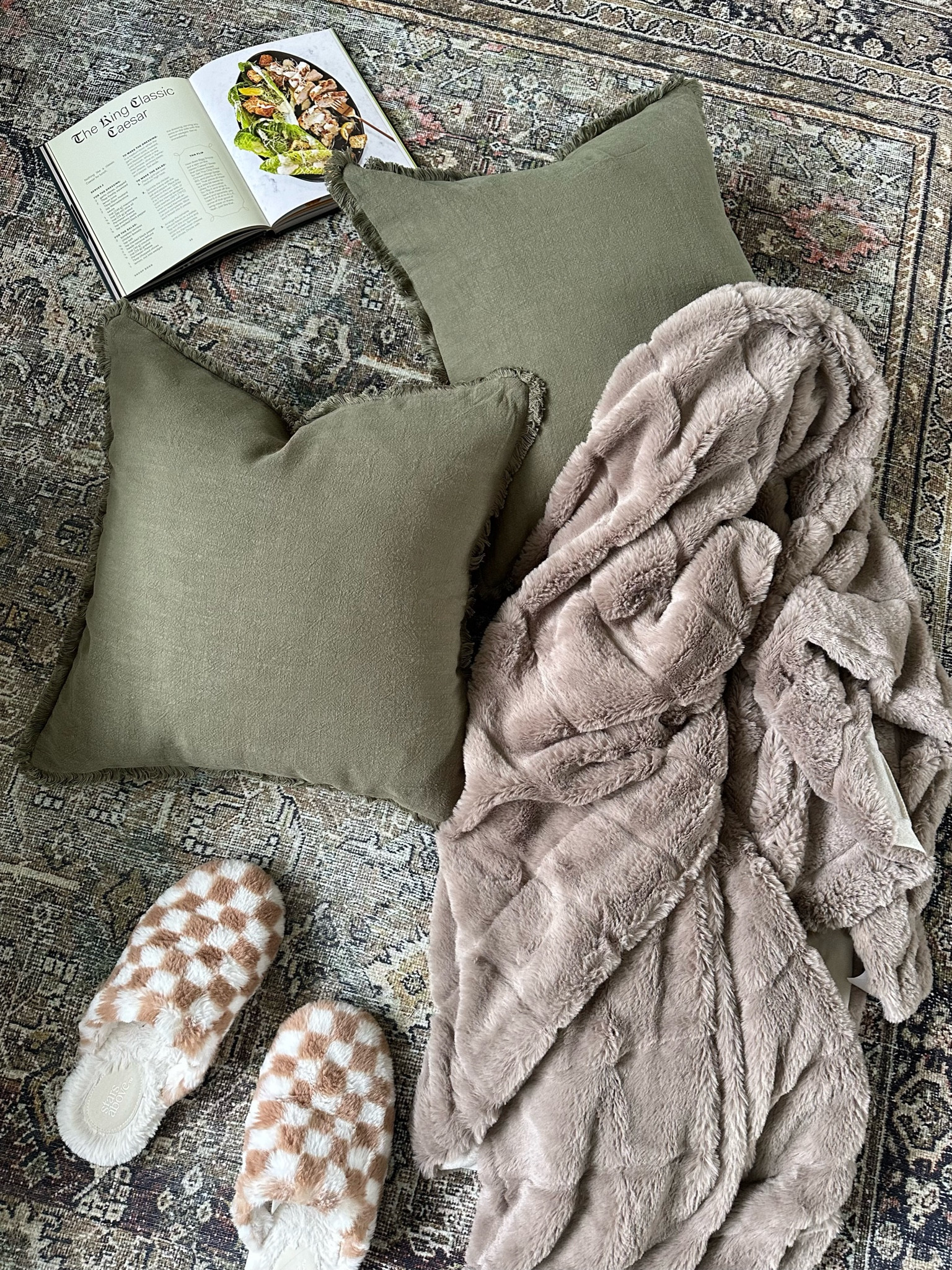 Just a little cozy moment with the softest throw blanket, aesthetically cozy slippers, perfect throw pillow covers and the best cookbook ever. #giftguide #homedecor

#LTKHoliday #LTKGiftGuide #LTKhome
