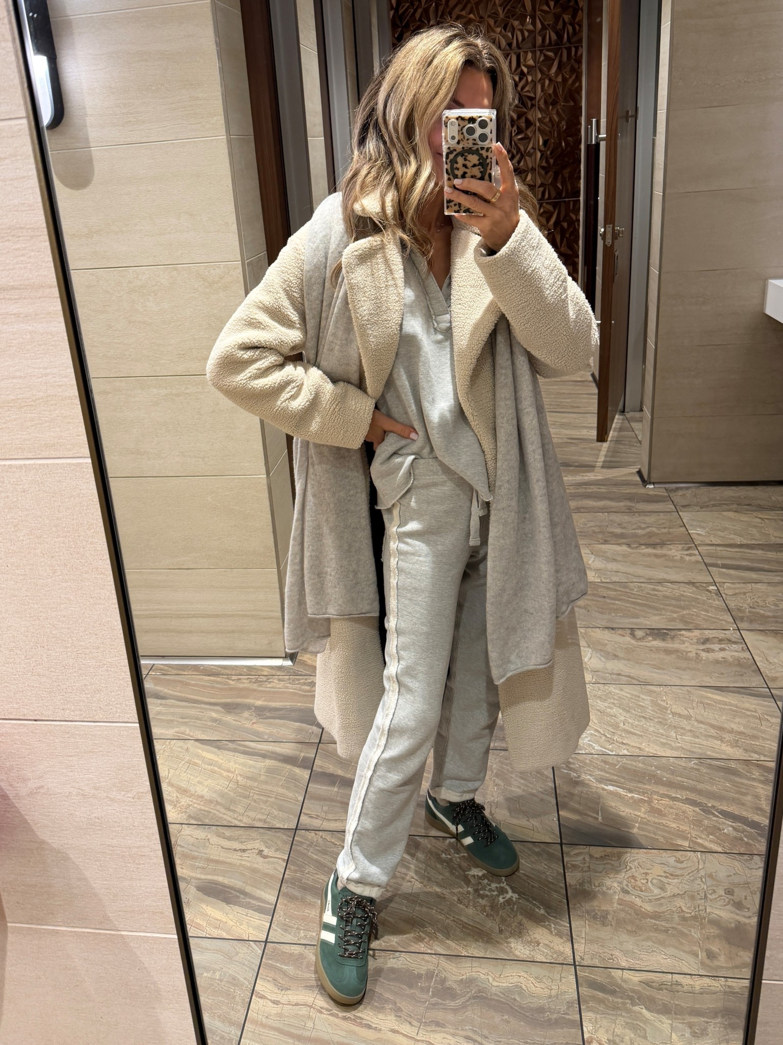 Overnight travel look to freezing weather. 
-elevated jersey set sz XS I’m 5’6”. My pant color is sold out, the will re-stock. Vintage white is a great choice too! 
-trendy sneakers 
-Sherpa jacket I’ve had forever, I’ve linked similar. 

Packed a turtle neck and fleece legging to layer under when we land since we cannot check into room yet. 

#LTKootd #LTKTravel #LTKOver40