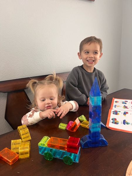 A new favorite toy. It’s easy for him to build a tower. He’s 3 years old. But it also has a book that you follow to make things. So I help him a lot. It’s just like magnatiles but full cubes 

#LTKGiftGuide #LTKfindsunder50 #LTKkids